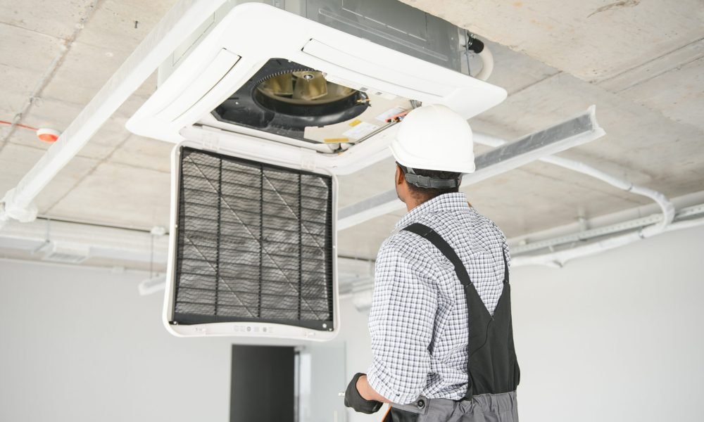 AC Electrician Technician Repairing Air Conditioner Appliance.