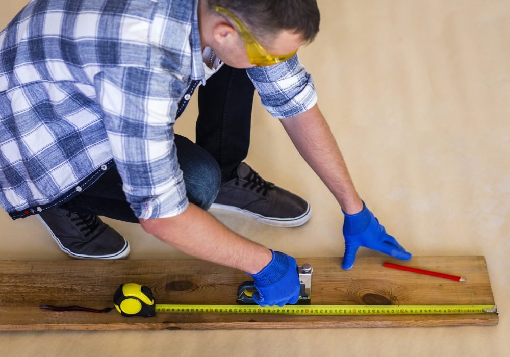 high-angle-man-working-wood